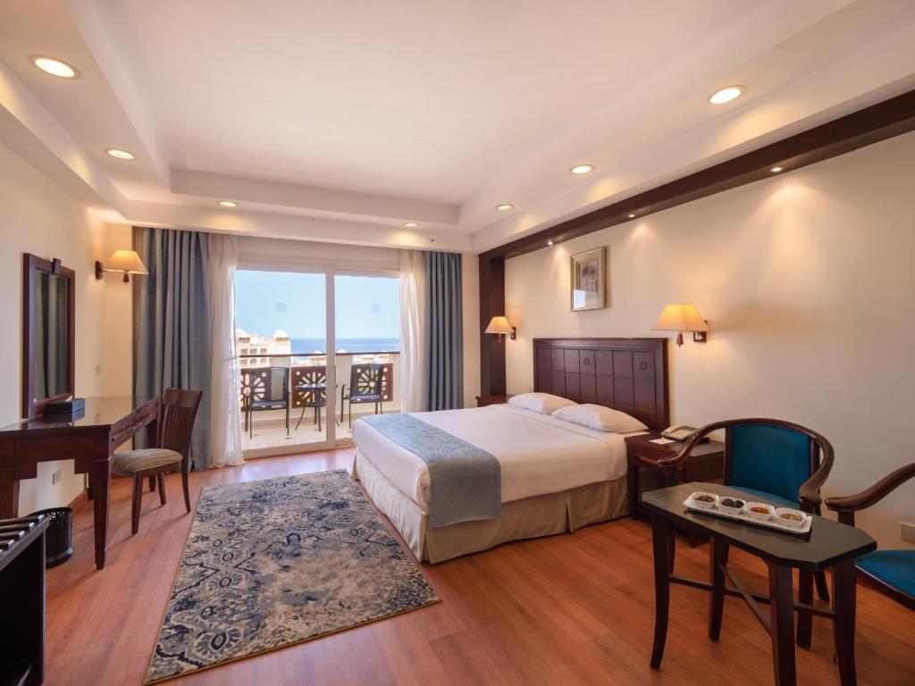 Сьюит (Представительский люкс с видом на море) курортного отеля Serenity Makadi Beach, Хургада