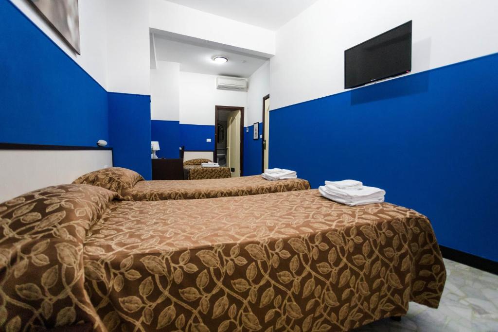Двухместный (Двухместный номер с 2 отдельными кроватями) отеля Mini Hotel, Генуя