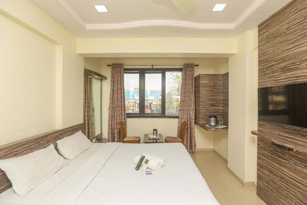 Двухместный (Стандартный двухместный номер с 1 кроватью) отеля Hotel Midtown, Мумбай