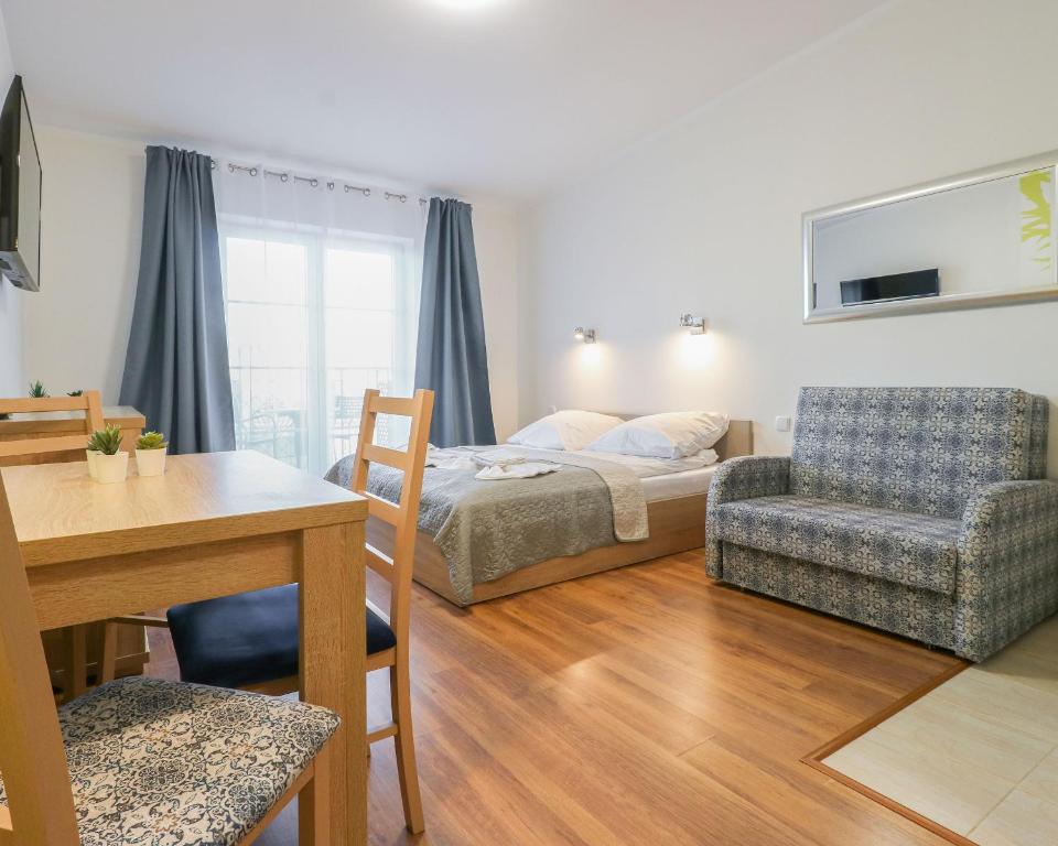 Двухместный (Двухместный номер с двуспальной кроватью и дополнительной кроватью) апартамента Baltic Home Regina Maris, Свиноуйсьце