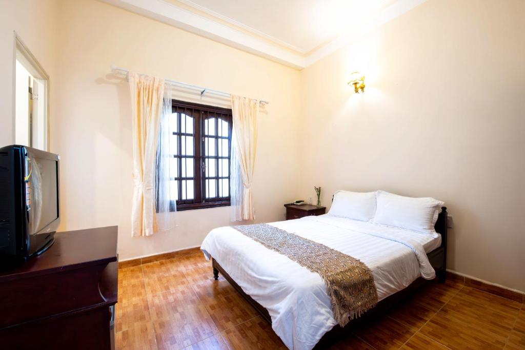 Двухместный (Стандартный двухместный номер с 1 кроватью или 2 отдельными кроватями) отеля Le Petit Paris Dalat Hotel, Далат
