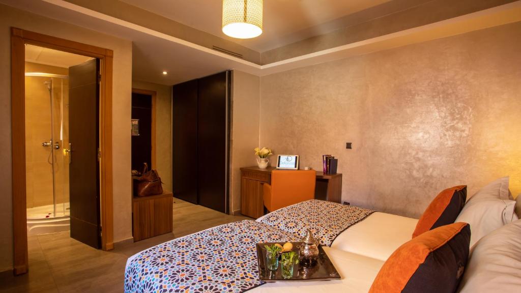 Двухместный (Привилегированный двухместный номер с 1 кроватью) отеля Dellarosa Hotel Suites & Spa, Марракеш