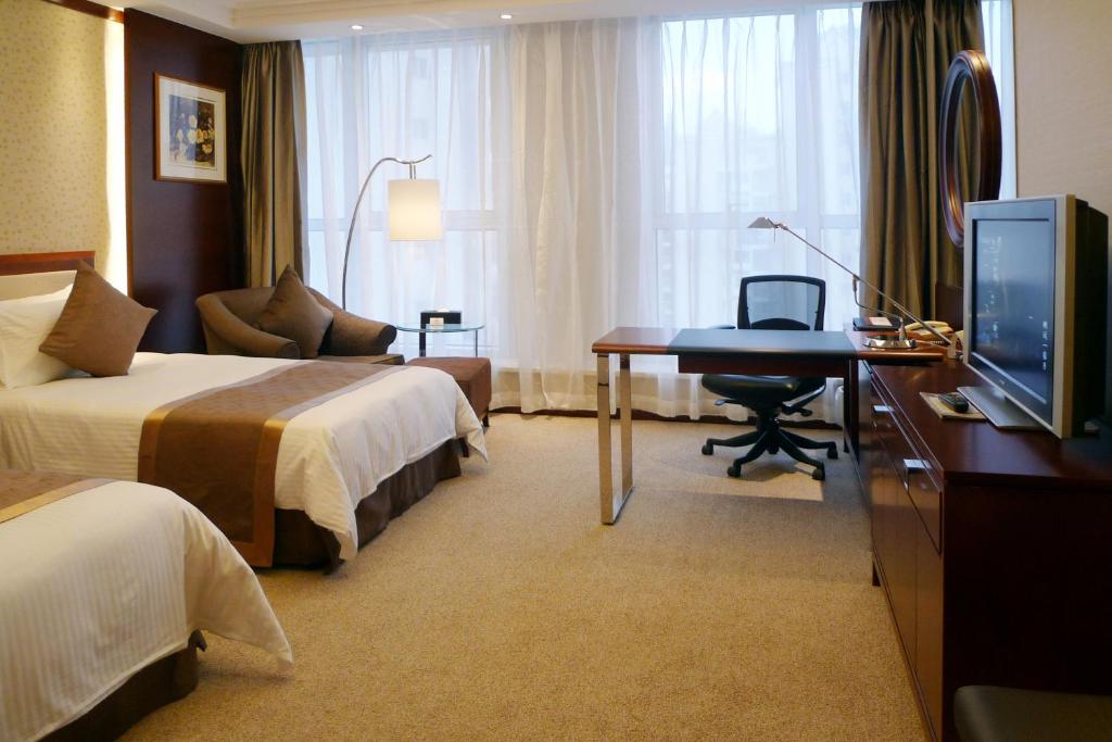 Двухместный (Улучшенный двухместный номер с 2 отдельными кроватями) отеля Central Hotel Shanghai, Шанхай