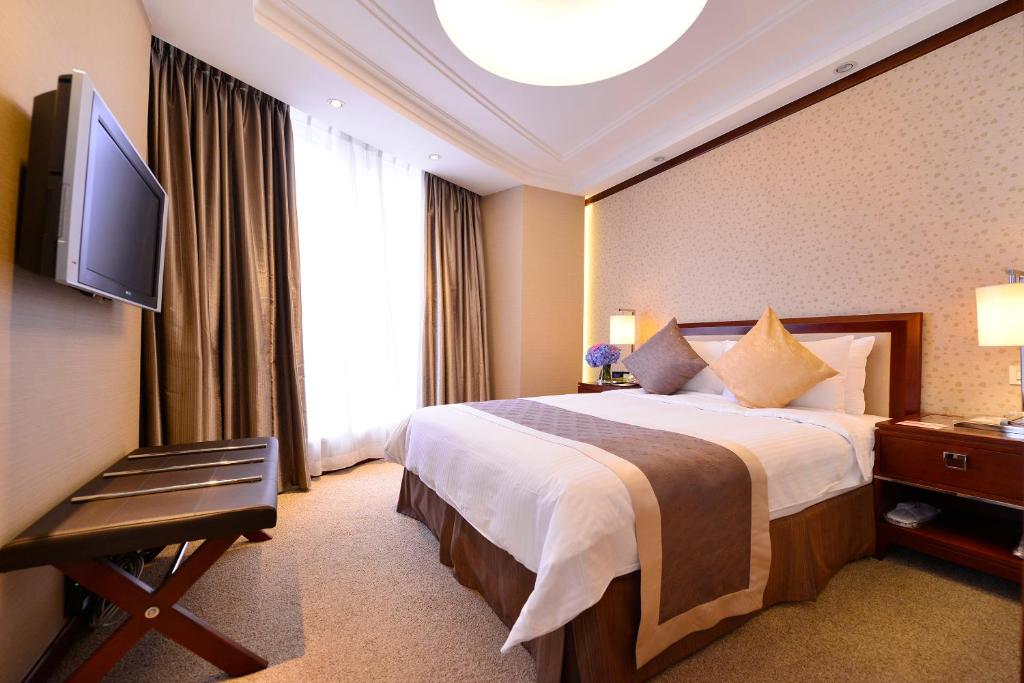 Двухместный (Улучшенный двухместный номер с 1 кроватью или 2 отдельными кроватями) отеля Central Hotel Shanghai, Шанхай