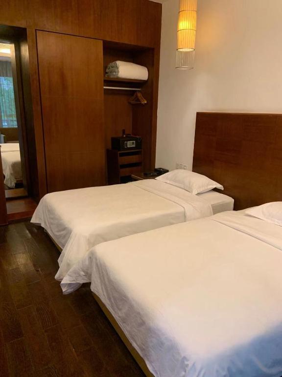 Двухместный (Стандартный двухместный номер с 1 кроватью или 2 отдельными кроватями и видом на сад) апарт-отеля Guangzhou Baiming Fangyuan Apartment, Гуанчжоу