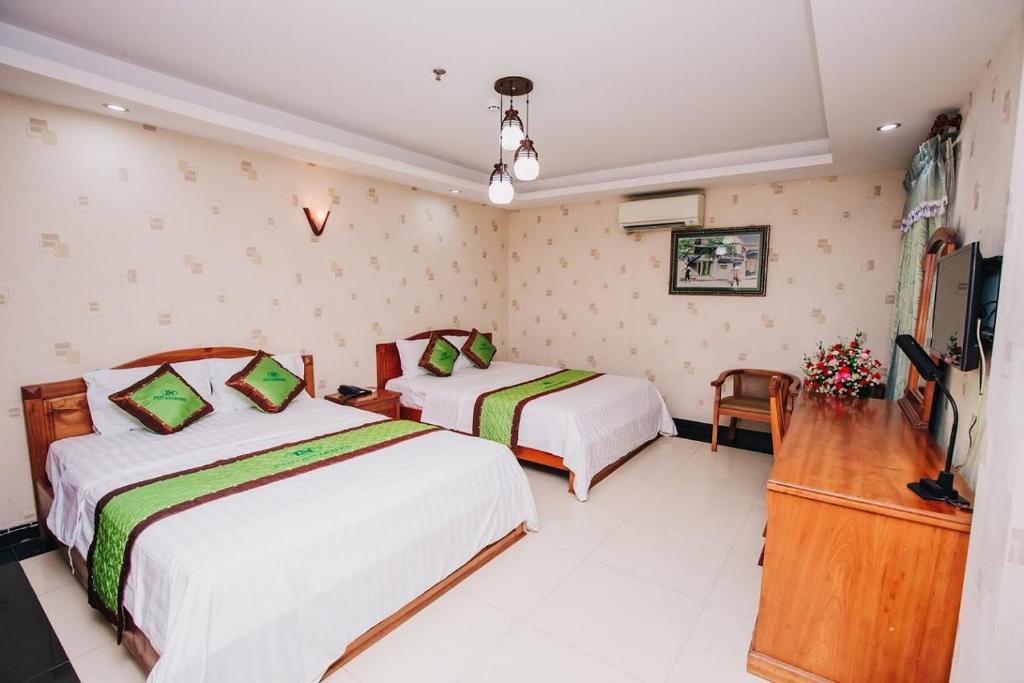 Двухместный (Двухместный номер Делюкс с 1 кроватью или 2 отдельными кроватями) отеля Phú An Hotel, Хошимин