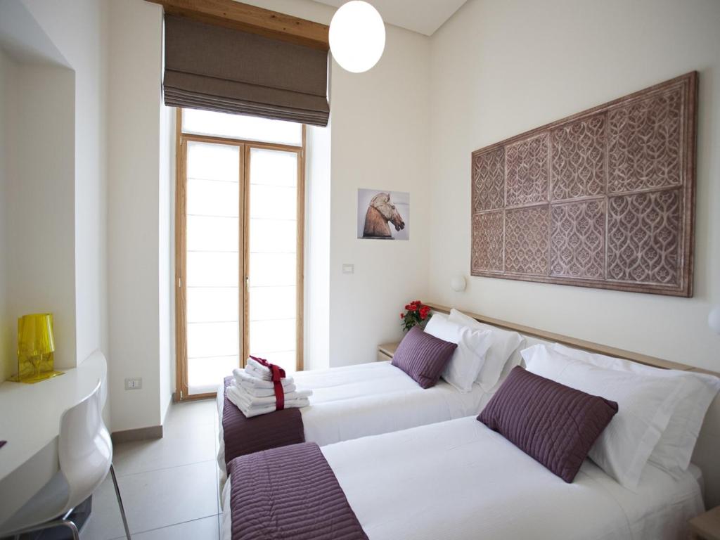 Двухместный (Двухместный номер с 1 кроватью или 2 отдельными кроватями и балконом) отеля Napolart, Неаполь