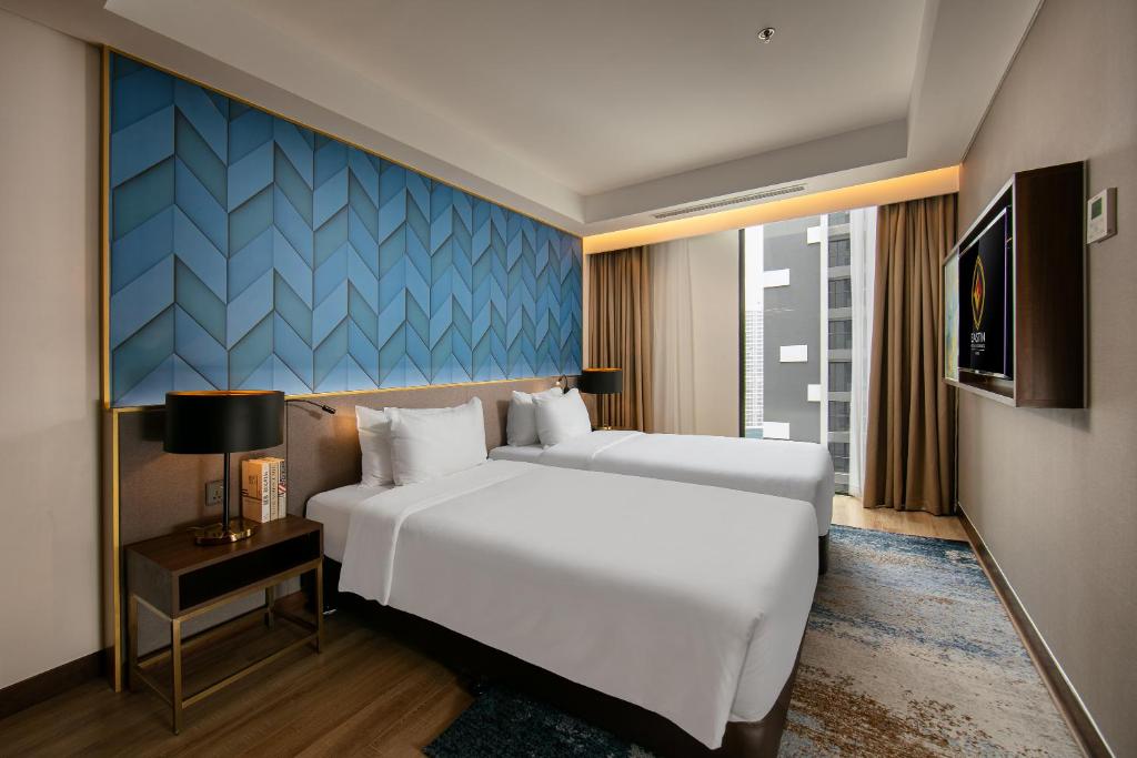 Двухместный (Улучшенный двухместный номер с 2 отдельными кроватями) отеля Eastin Hotel & Residences Hanoi, Ханой