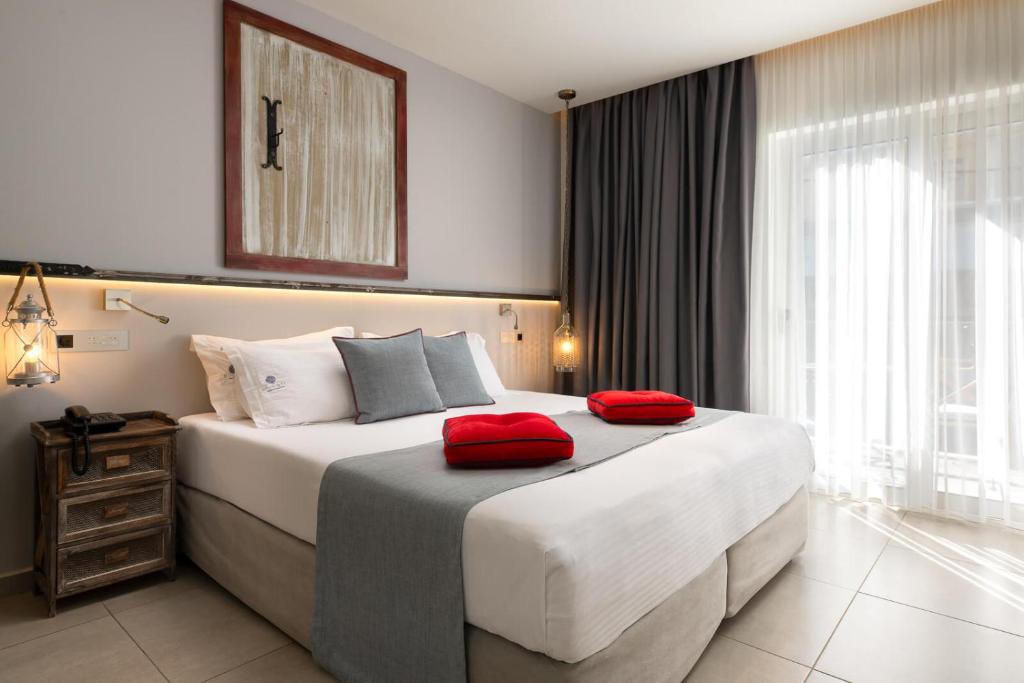 Двухместный (Двухместный номер Делюкс с 1 кроватью или 2 отдельными кроватями и балконом) отеля Elakati Luxury Boutique Hotel - Adults Only, Родос