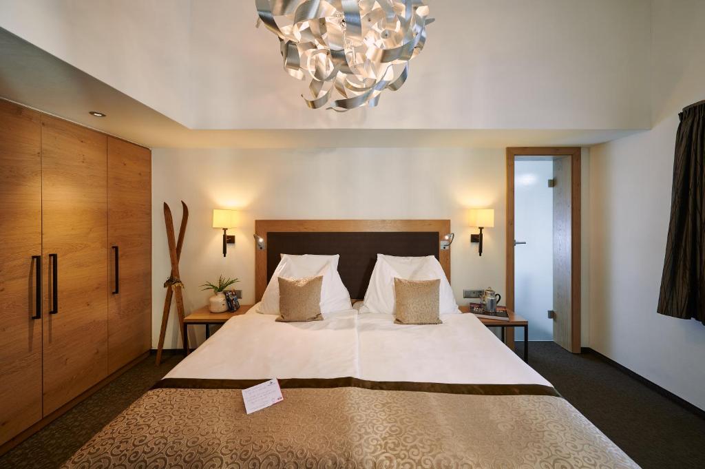 Двухместный (Улучшенный двухместный номер с 1 кроватью) отеля Hotel Ambiance Superior, Церматт