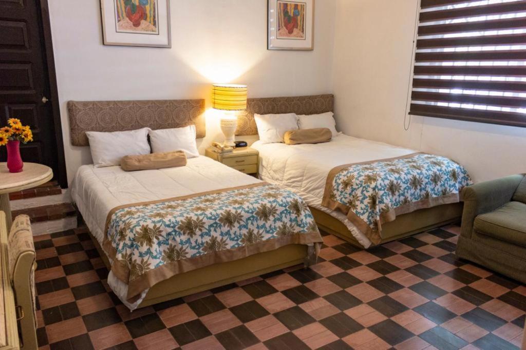 Двухместный (Двухместный номер с 2 отдельными кроватями) отеля Hotel Petit Maria Jose, Гвадалахара