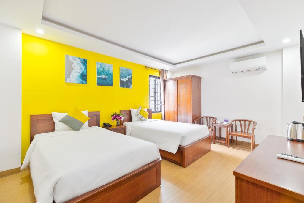 Двухместный (Двухместный номер Делюкс с 2 отдельными кроватями) отеля The Samson - Beach Boutique Hotel, Дананг