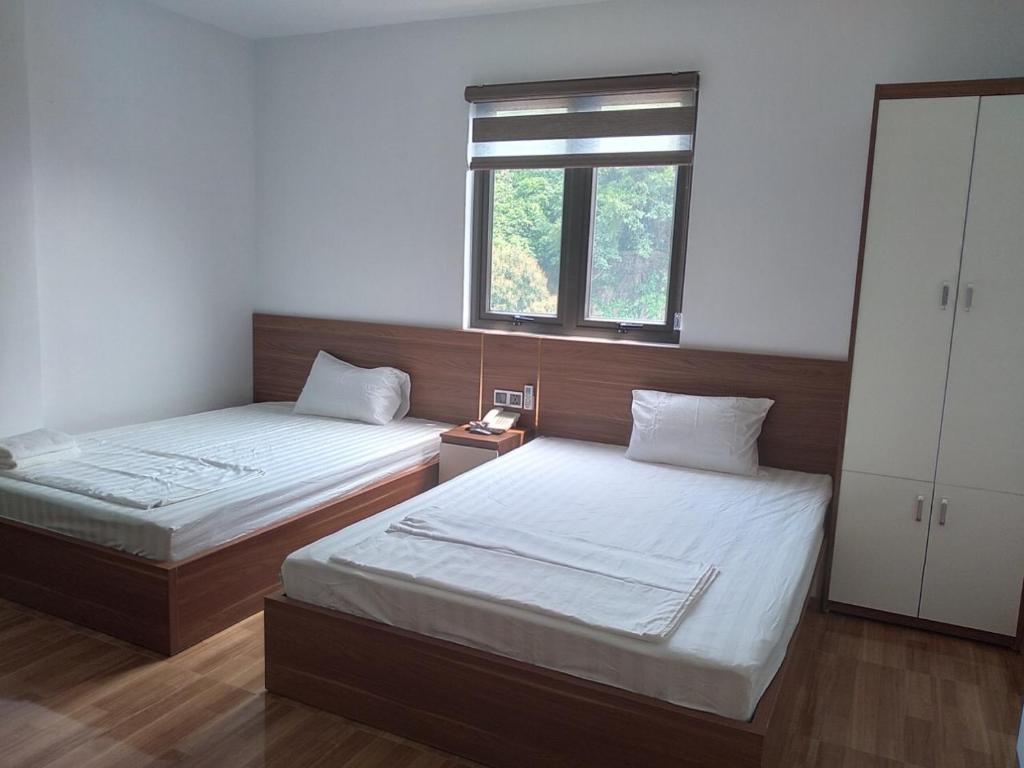Двухместный (Двухместный номер с 2 отдельными кроватями и видом на горы) отеля Hải Âu Cát Bà Hotel, Катба