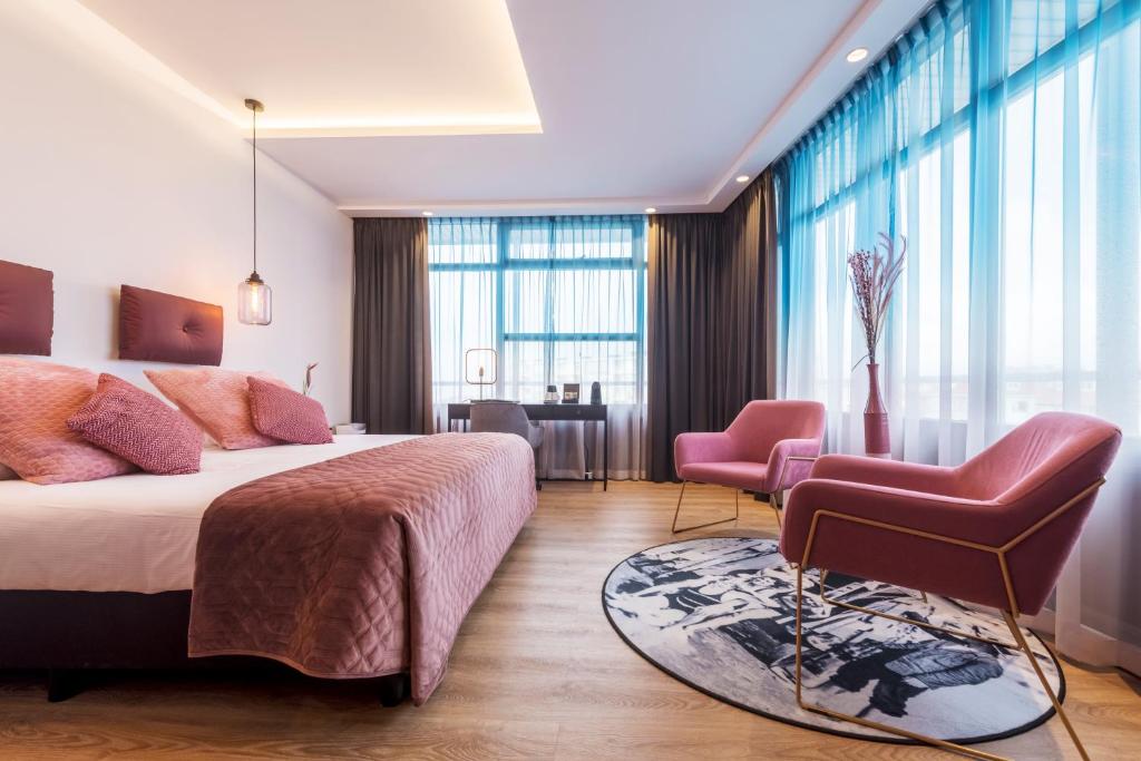 Двухместный (Просторный двухместный номер с 2 отдельными кроватями, боковой вид на море) отеля Palace Hotel Zandvoort, Зандфорт
