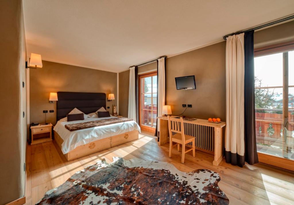 Двухместный (Улучшенный двухместный номер с 1 кроватью или 2 отдельными кроватями) отеля Agriturismo Rini, Бормио
