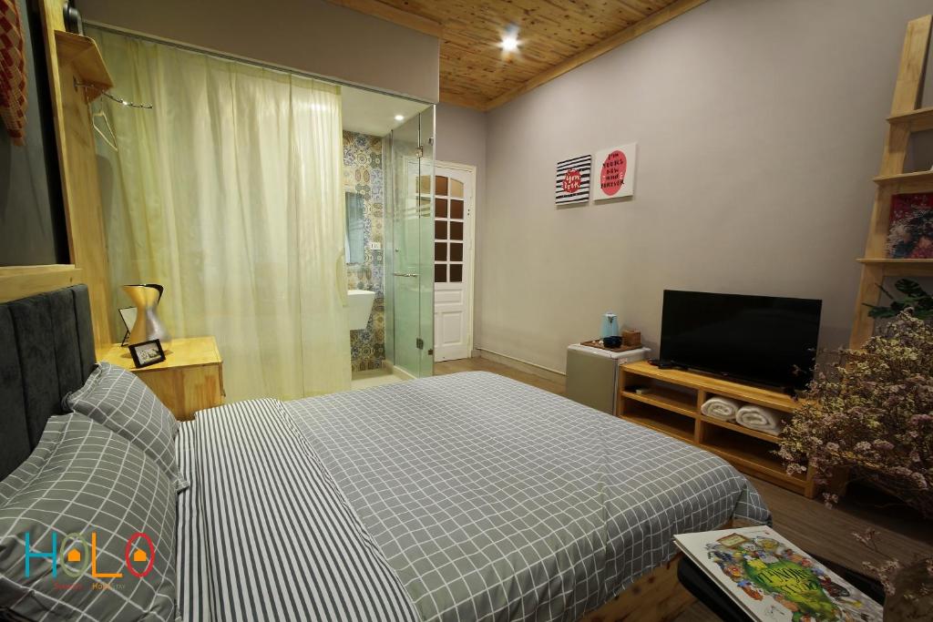 Двухместный (Двухместный номер Делюкс с 1 кроватью), HoLo Fairy House Hanoi - Serviced HomeStay