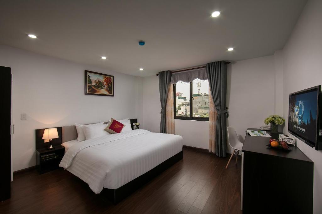Двухместный (Двухместный номер Делюкс с 1 кроватью) отеля Hanoi Aria Central Hotel & Spa, Ханой