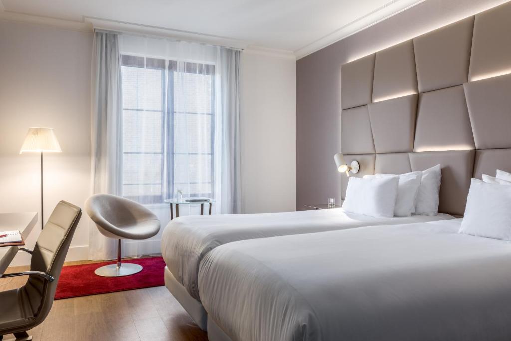Двухместный (Улучшенный двухместный номер с 1 кроватью или 2 отдельными кроватями) отеля NH Collection Brussels Grand Sablon, Брюссель