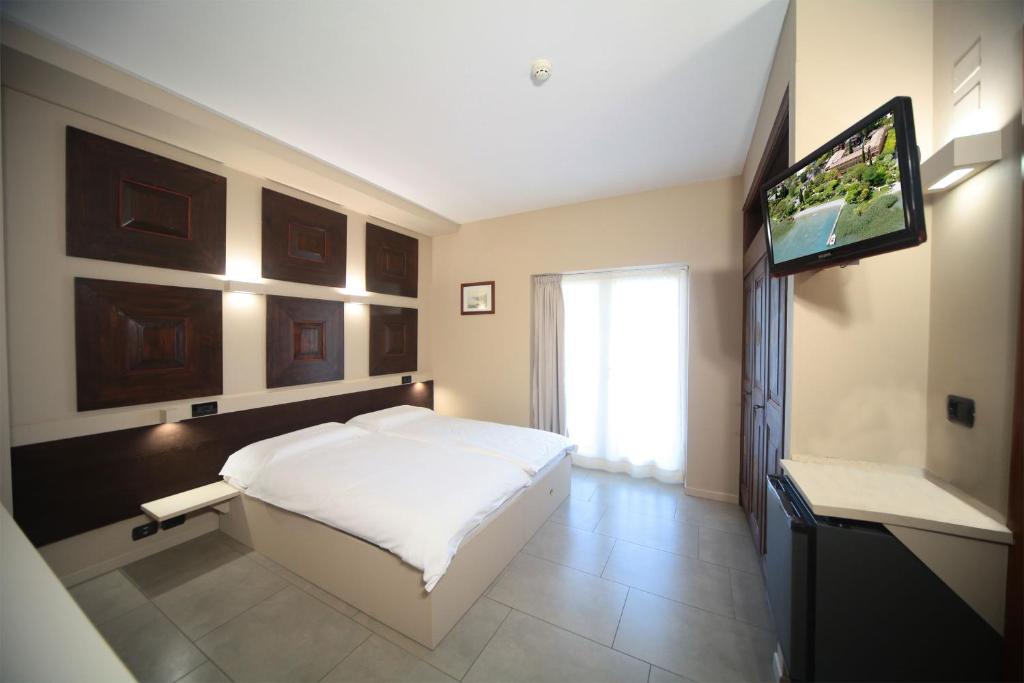 Двухместный (Классический двухместный номер с 1 кроватью) отеля Hotel La Paül, Сирмионе