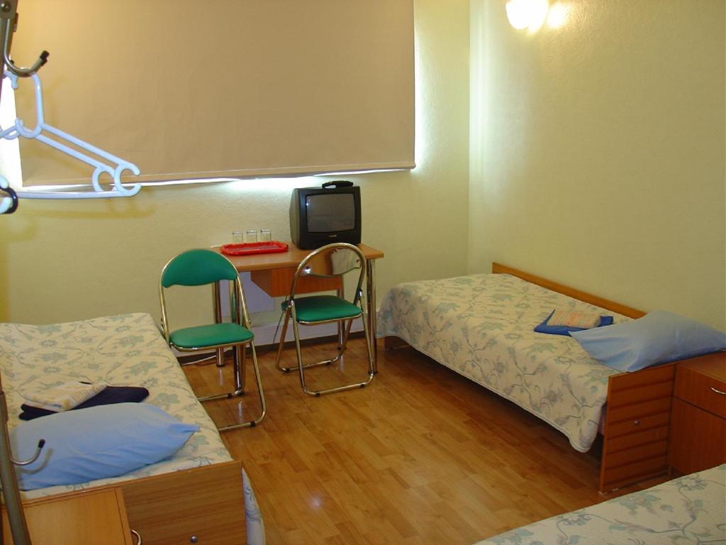 Двухместный (Двухместный номер с 2 отдельными кроватями и общей ванной комнатой) гостевого дома Kuressaare Airport Guest House, Курессааре