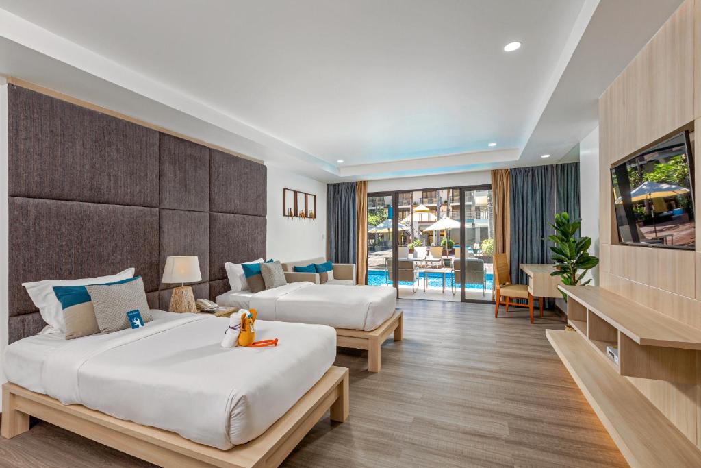 Двухместный (Двухместный номер Делюкс с 1 кроватью или 2 отдельными кроватями, доступ к бассейну) отеля Baan Laimai Beach Resort, Пхукет