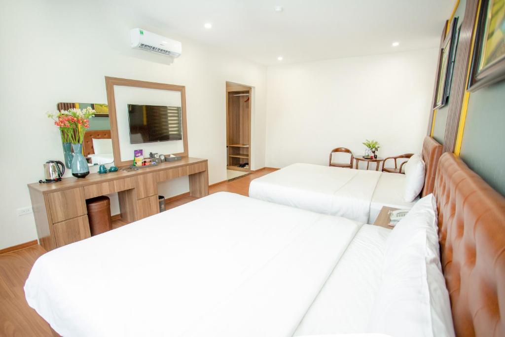 Двухместный (Двухместный номер с 2 отдельными кроватями и окном) отеля MOMALI Hotel Ninh Binh, Ниньбинь
