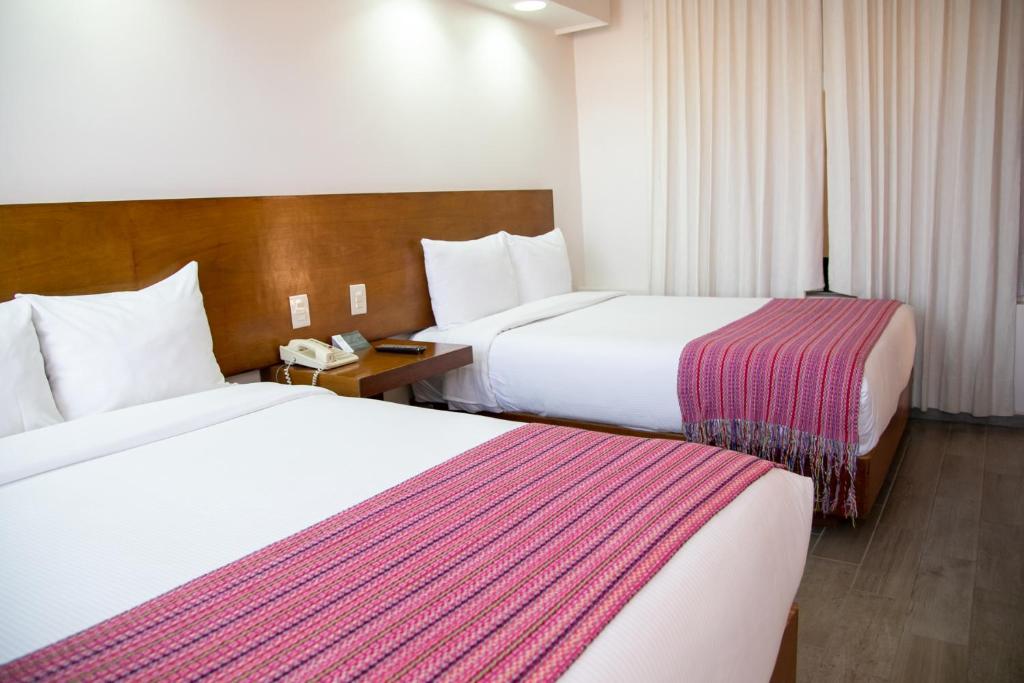 Двухместный (Двухместный номер с 2 отдельными кроватями) отеля Hotel Alameda Centro Historico, Морелия