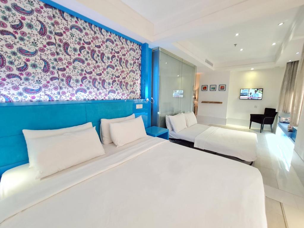 Четырехместный (Annexe Deluxe Suite (non-smoking room)) отеля Arenaa Star Hotel, Куала-Лумпур