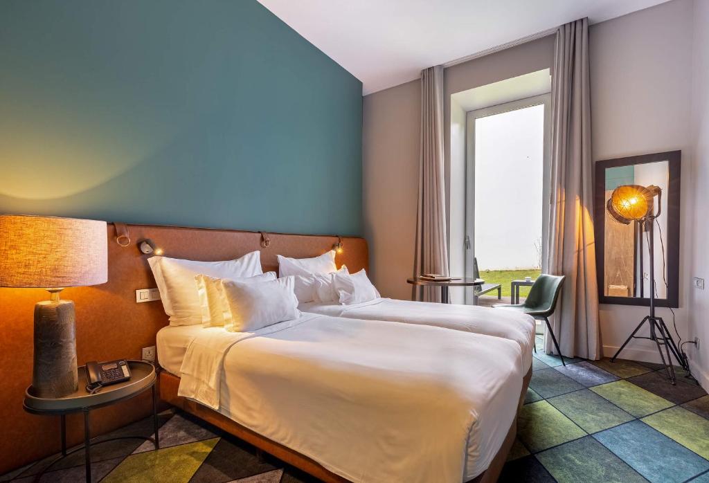 Двухместный (Двухместный номер с 1 кроватью и террасой) отеля Furnas Boutique Hotel - Thermal & Spa, Фурнаш