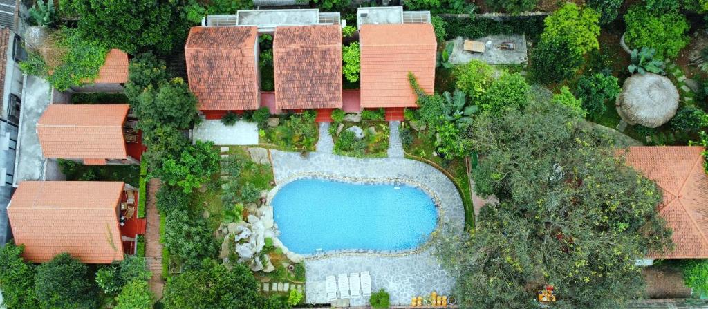 Трехместный (Трехместный номер с видом на бассейн) семейного отеля Ninh Binh Family Homestay, Ниньбинь