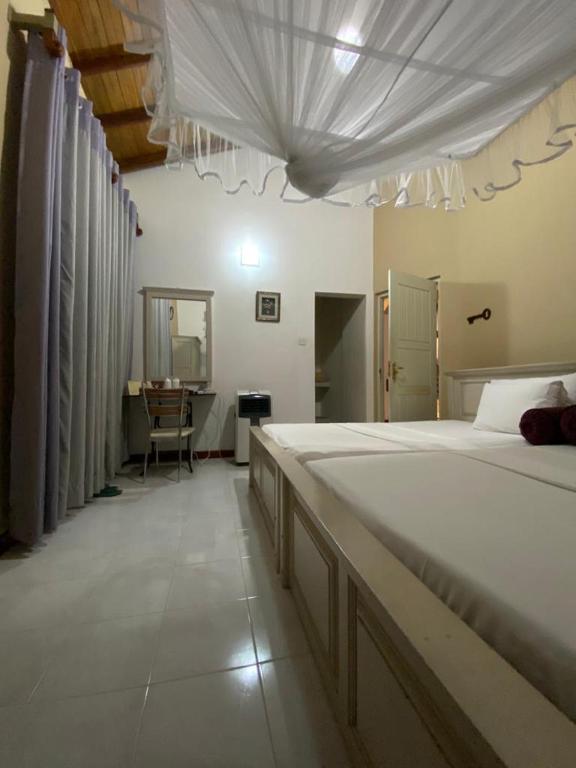 Двухместный (Двухместный номер с 2 отдельными кроватями и балконом) семейного отеля Vista House Kandy, Канди