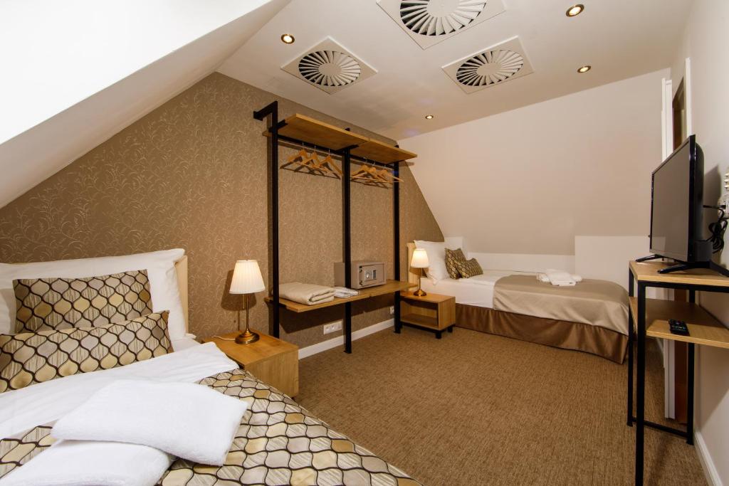 Двухместный (Стандартный двухместный номер с 2 отдельными кроватями) отеля APLEND CITY Hotel Michalska, Братислава
