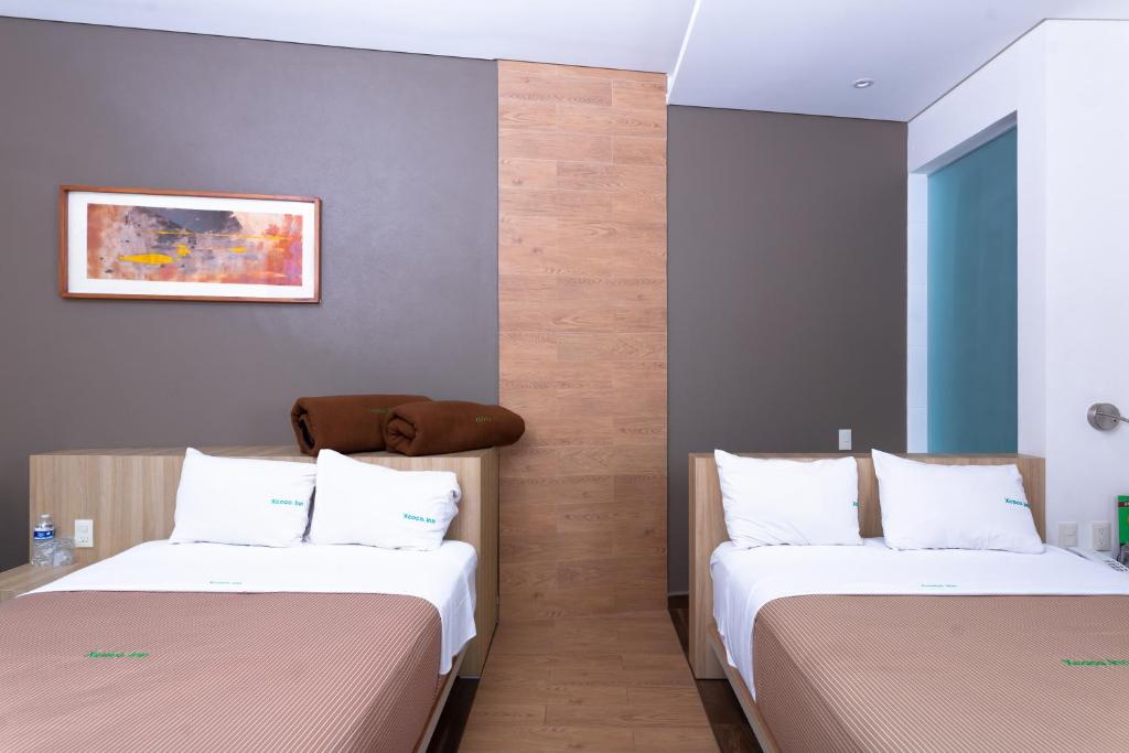 Двухместный (Улучшенный двухместный номер с 2 отдельными кроватями) отеля Xcoco Inn, Теккоко-де-Мора