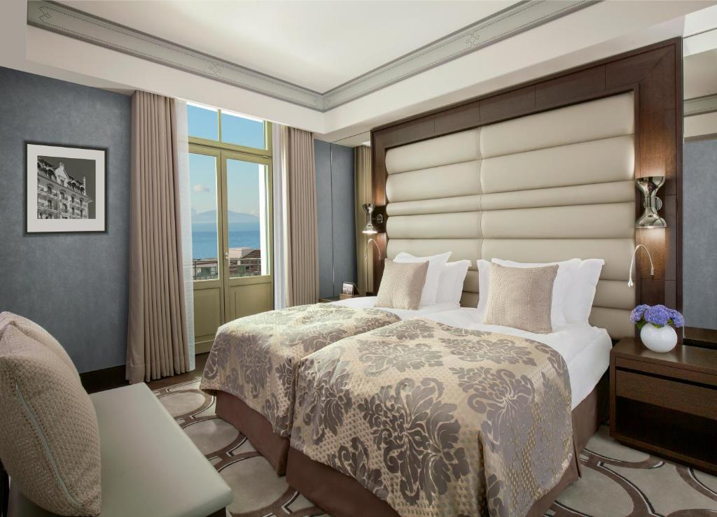 Двухместный (Представительский двухместный номер с 1 кроватью, видом на озеро и доступом в спа-центр) отеля Royal Savoy Hotel & Spa, Лозанна