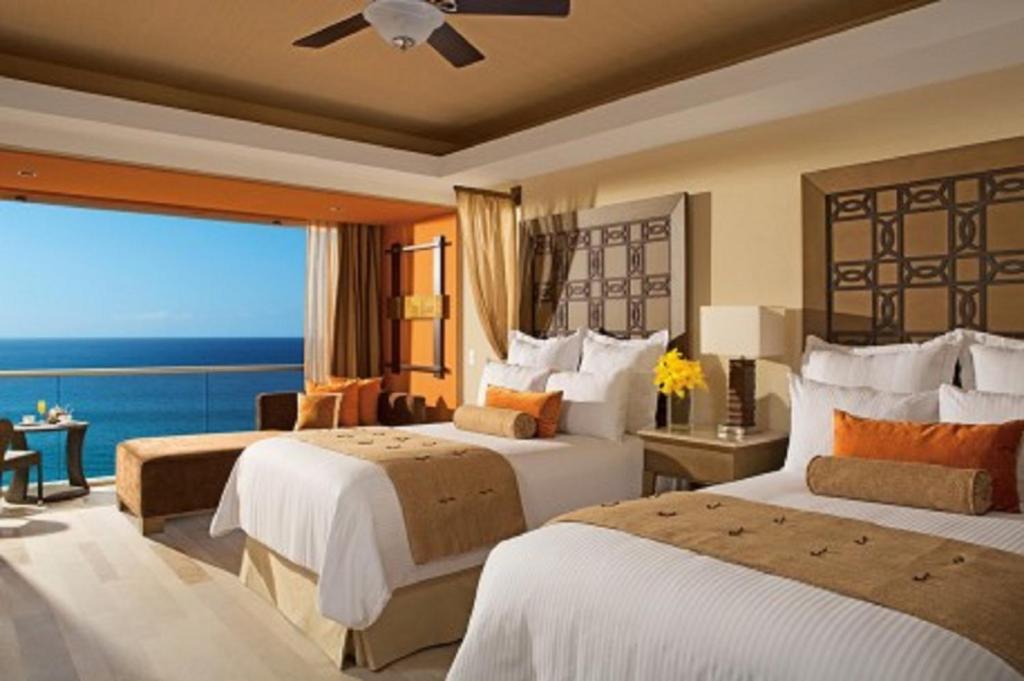 Сьюит (Полулюкс с 2 двуспальными кроватями и видом на океан) курортного отеля Now Amber Resort & SPA, Пуэрто-Вальярта