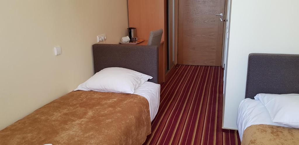 Двухместный (Стандартный двухместный номер с 2 отдельными кроватями) отеля Hotel Dainava, Друскининкай