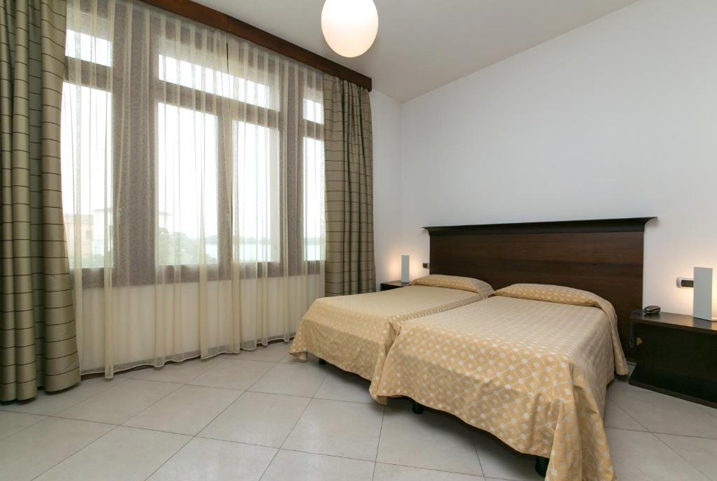 Двухместный (Классический двухместный номер с 2 отдельными кроватями) отеля Centro Soggiorno San Servolo, Венеция