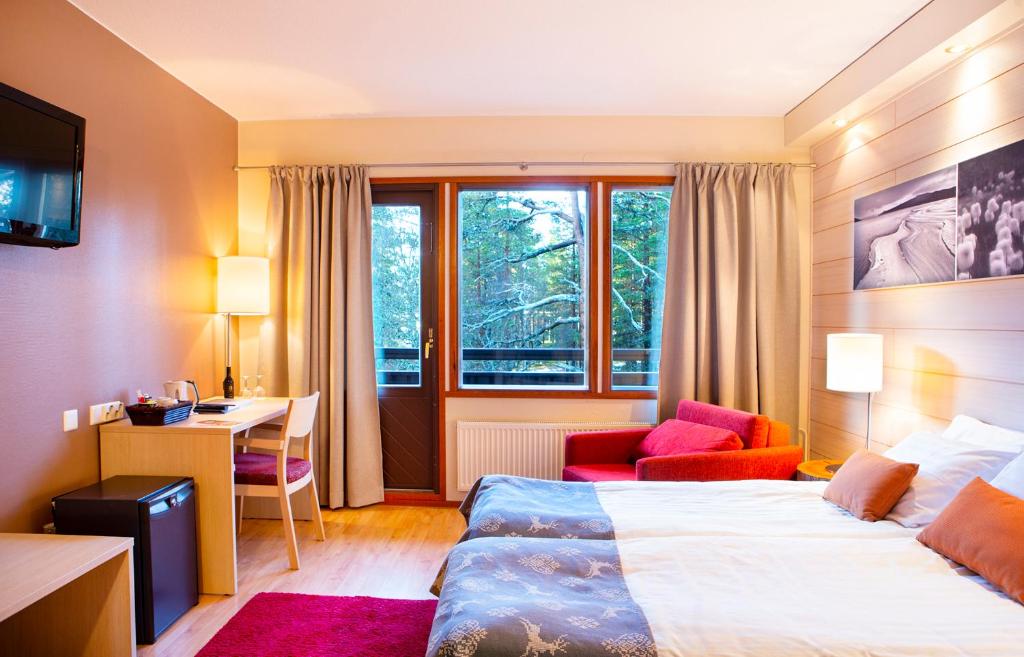 Двухместный (Улучшенный двухместный номер с 2 отдельными кроватями) отеля Lapland Hotels Riekonlinna, Саариселькя