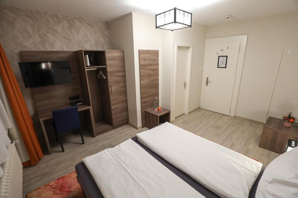 Двухместный (Стандартный двухместный номер с 1 кроватью или 2 отдельными кроватями) отеля Hotel Spatz, Люцерн
