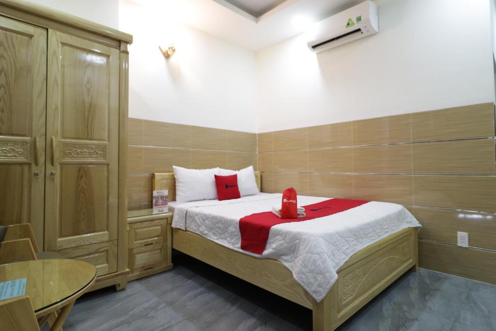 Двухместный (Улучшенный двухместный номер с 1 кроватью) отеля RedDoorz Phan Anh Street, Хошимин