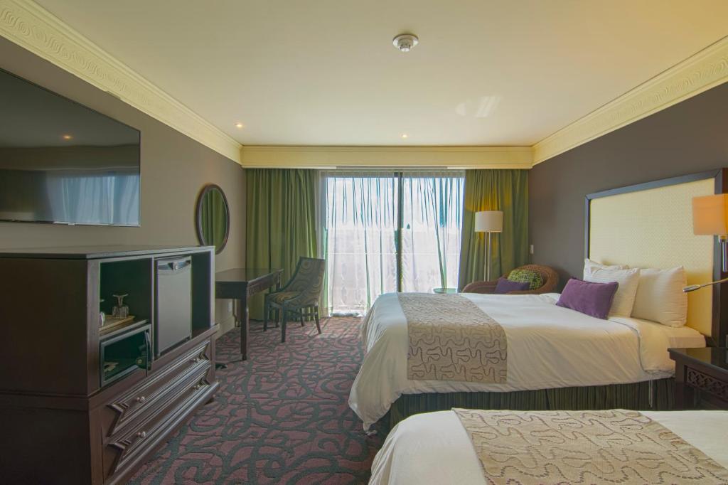 Двухместный (Двухместный номер «Люцерна Селект» с 2 двуспальными кроватями) отеля Hotel Lucerna Culiacan, Кульякан