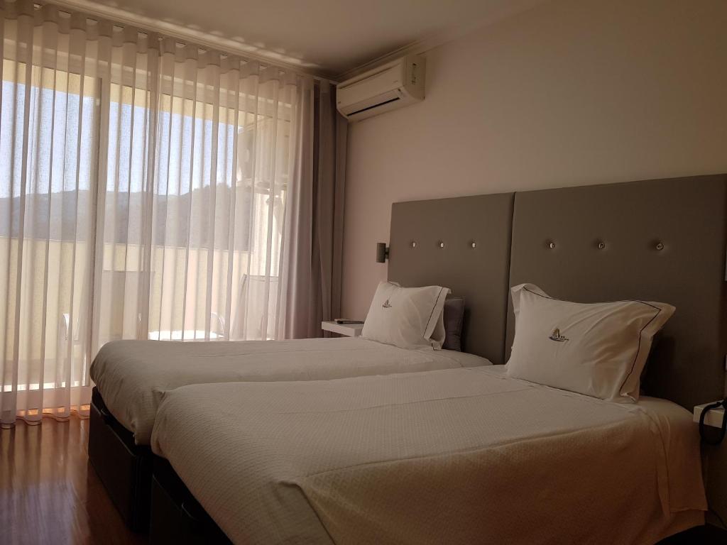 Двухместный (Двухместный номер с 2 отдельными кроватями) отеля Hotel Lagoa Azul do Geres, Герес