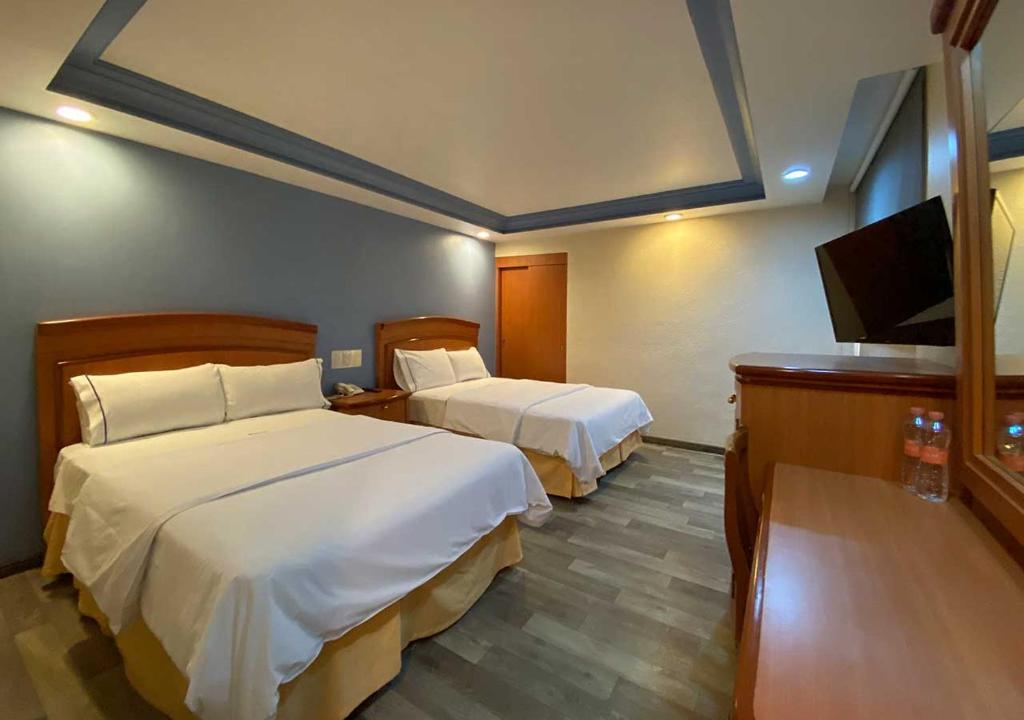 Двухместный (Двухместный номер с 2 двуспальными кроватями) отеля Hotel San Diego, Мехико