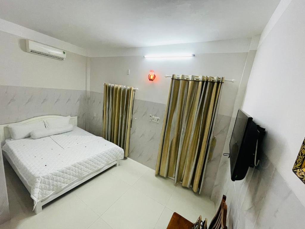 Двухместный (Стандартный двухместный номер с 1 кроватью) отеля Nhà Nghỉ Đức Linh 1, Дуонг-Донг