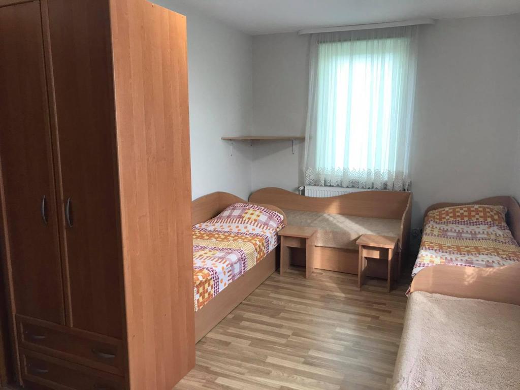 Четырехместный (Четырехместный номер с общей кухней) семейного отеля Rooms for Rent near Vilnius, Вильнюс