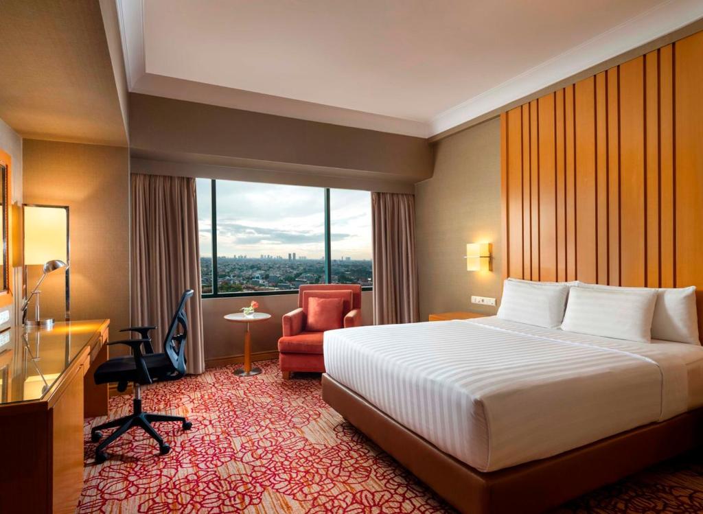 Двухместный (Двухместный номер Делюкс с 1 кроватью) отеля Hotel Ciputra Jakarta, Джакарта