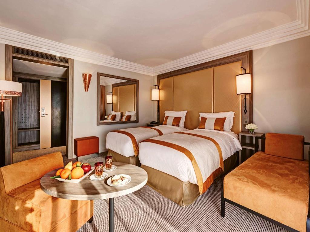 Двухместный (Улучшенный двухместный номер с 2 отдельными кроватями) отеля Mövenpick Hotel Mansour Eddahbi Marrakech, Марракеш