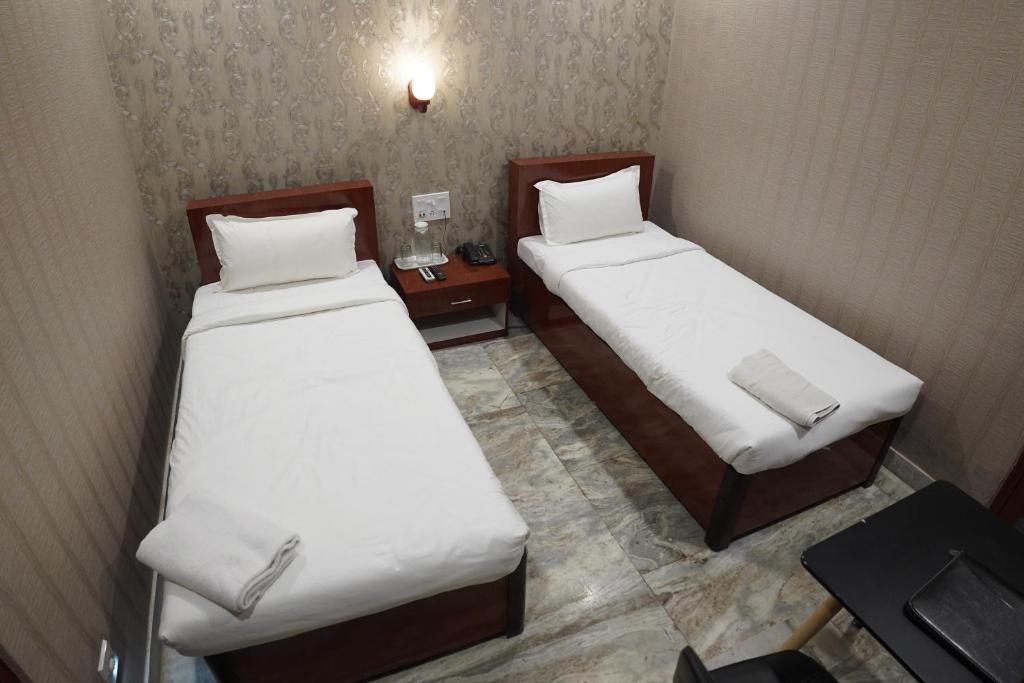 Двухместный (Улучшенный двухместный номер с 1 кроватью или 2 отдельными кроватями) отеля HOTEL PARK VICTORIA, Калькутта