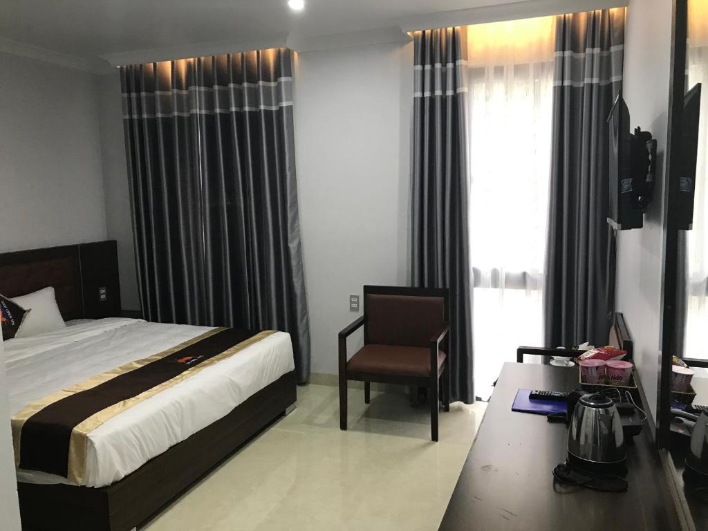 Двухместный (Двухместный номер Делюкс с 1 кроватью или 2 отдельными кроватями, вид на город) апарт-отеля sun homes hotel, Халонг