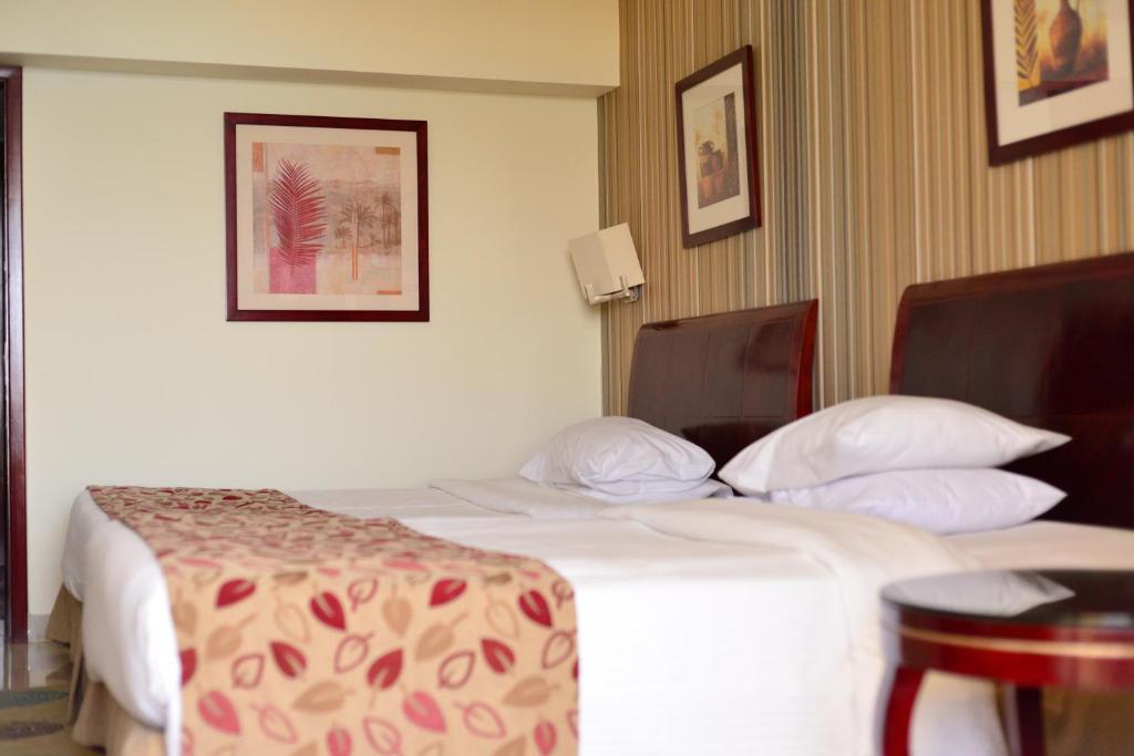Двухместный (Двухместный номер Делюкс с 1 кроватью или 2 отдельными кроватями и видом на море) курортного отеля Helnan Marina Sharm Hotel, Шарм-эль-Шейх